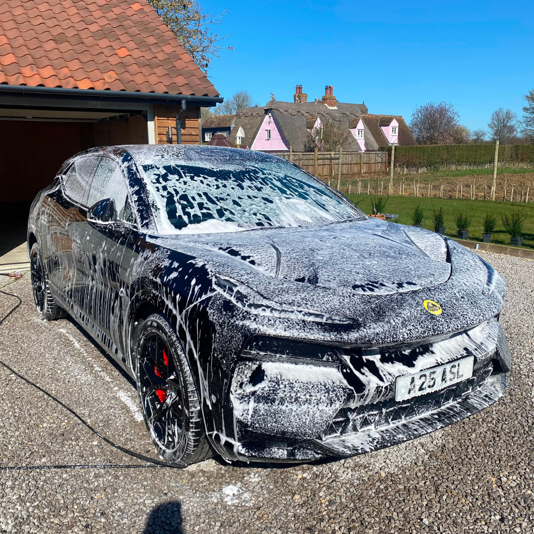 Lotus Eletre thick snow foam wash on gravel driveway — mobile detailing Suffolk
